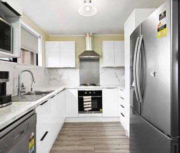 Freshly Renovated Three Bedroom - Photo 2