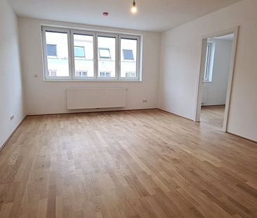 OSPELGASSE, klimatisierte 49 m2 Dachgeschoß, 2 Zimmer, Komplettküche, Wannenbad, Parketten, ruhige Lage - Photo 2