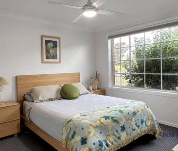 Two-Bedroom Duplex with Pool - Prime Location Near Orana Mall - Photo 5
