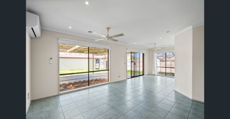 Spacious Family Living with Multiple Living Zones! - Photo 3