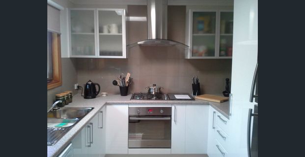 Neat 3BR Family Home with Gardens & Workshop - Photo 1