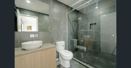 Spacious and Versatile Three-Bedroom Townhome in Prime Family Location!! - Photo 2