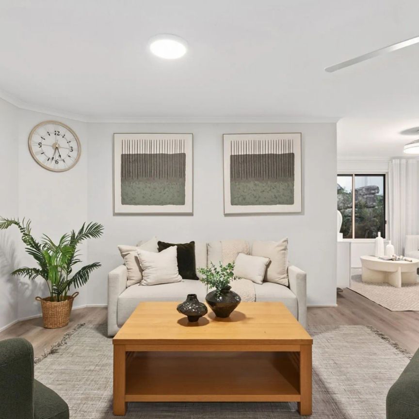 A stylish newly renovated home in one of Wishart's most sought-after pockets, perfectly positioned for families in Mansfield State School Catchment. - Photo 1