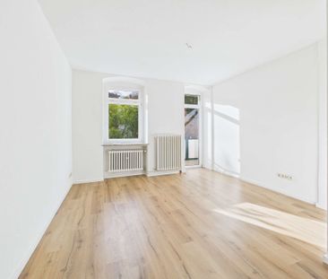 Helle 3-Zimmer Souterrainwohnung mit Balkon in zentraler Wohnlage v... - Foto 1