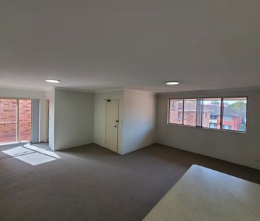 Penthouse Style unit | Great Location | Lock up garage - Photo 1