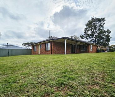 Well-appointed four-bedroom family home - Photo 3