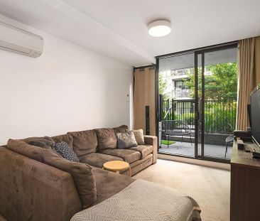 Fully Furnished One Bedroom Apartment with Private Courtyard - Photo 1