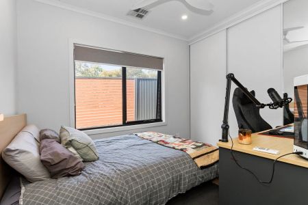 Nestled in the heart of Happy Valley, South Australia, lies a charming three-bedroom house available for lease. - Photo 4