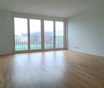 Schöne Neubau-Familienwohnung an der Mühlenau - Photo 2