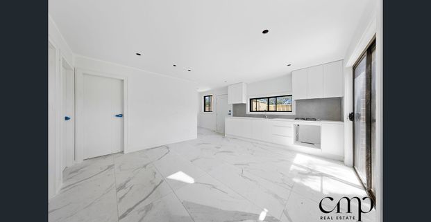 Brand-New, Sleek & Modern Living! - Photo 1