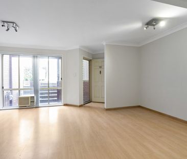 Neat 3 Bedroom Townhouse - Photo 1