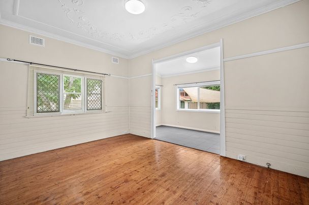 Three-Bedroom Home with Spacious Backyard - Photo 1