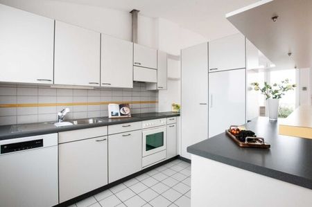 Living in the Mühlefeld shopping center - Photo 3