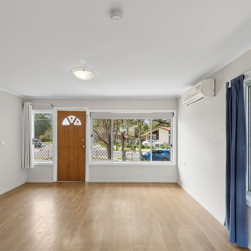 Versatile Family Living in a Prime Location! - Photo 1