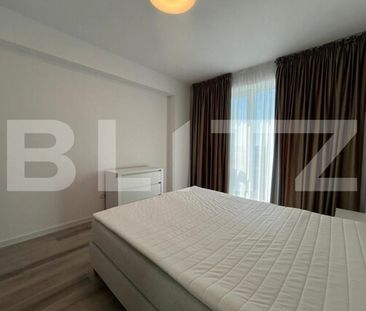 Prima închiriere: Apartament cu 2 camere, parcare privată, President Residence - Photo 4