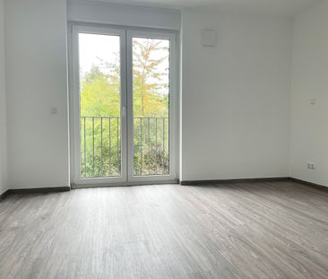 Neubau! 3-Zimmer-Wohnung mit Einbauküche, Tiefgaragenstellplatz und Ostbalkon in Rostock-Groß Klein - Photo 2