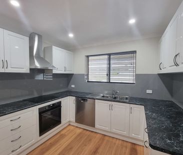 Renovated Three-Bedroom Unit in a Boutique Complex - Photo 5