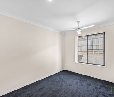 Stylish, Spacious, and Set to Impress - Welcome to 28 Liriope Drive! - Photo 5