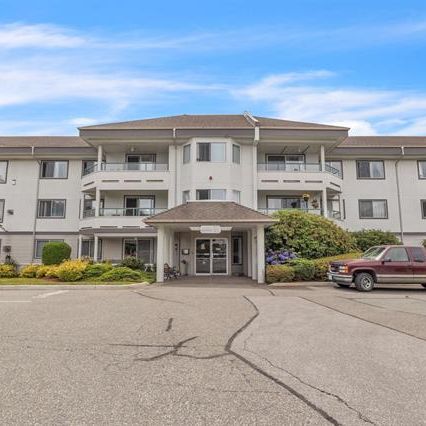 Spacious 55+ Condo with Elevator Access - Photo 1