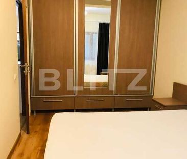 Apartament de 2 camere situat intr-o zona linistita si cu o terasa perfecta pentru momente de relaxare - Fotografie 3