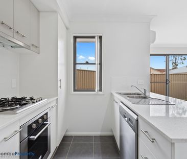 This impeccably presented lowset brick unit is sure to impress! - Photo 3