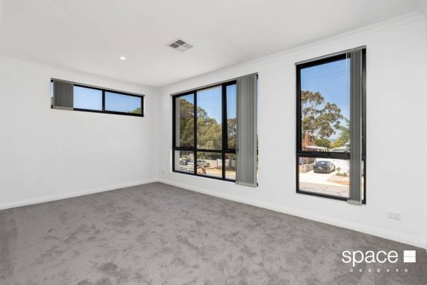 Low maintenance, modern and ready for you to call home! - Photo 1