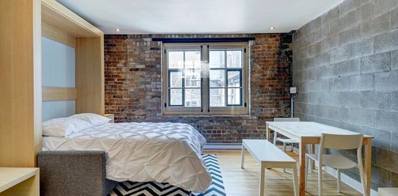 Loft entièrement meublé à louer Vieux-Québec décembre 2025 - Photo 2