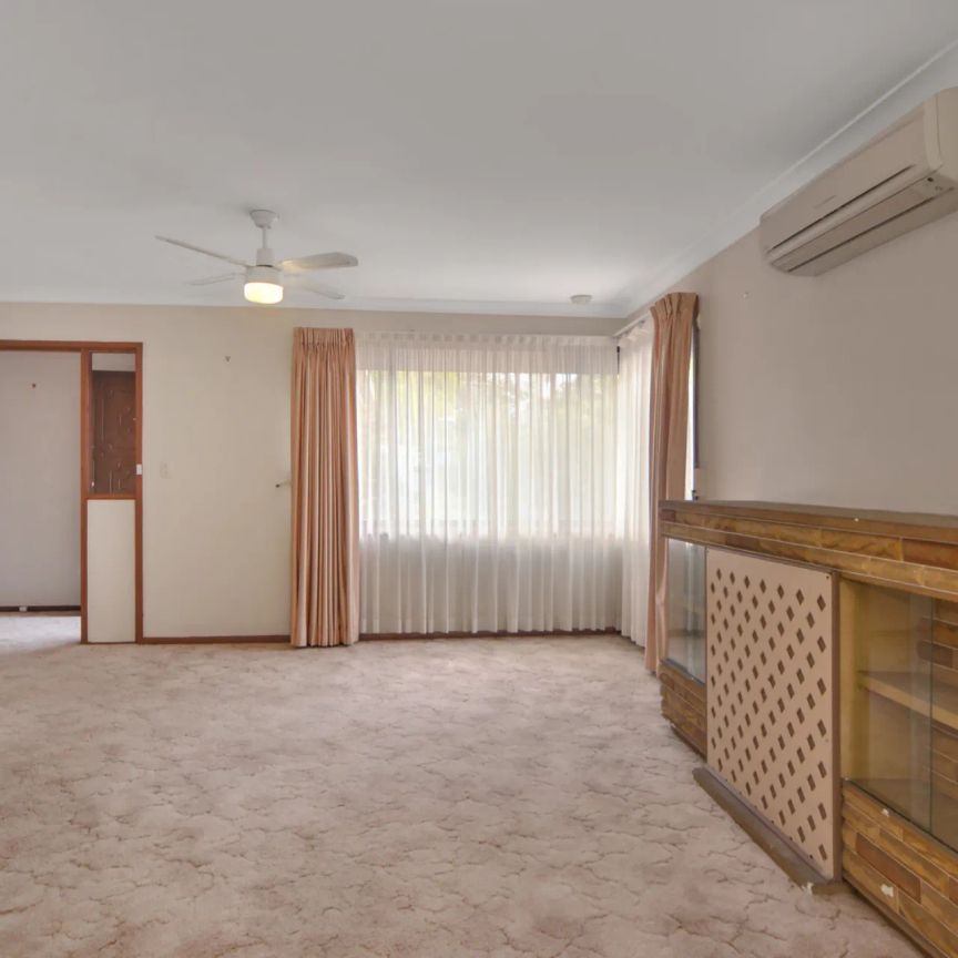 Comfortable Family Living in a Convenient Location - Photo 1
