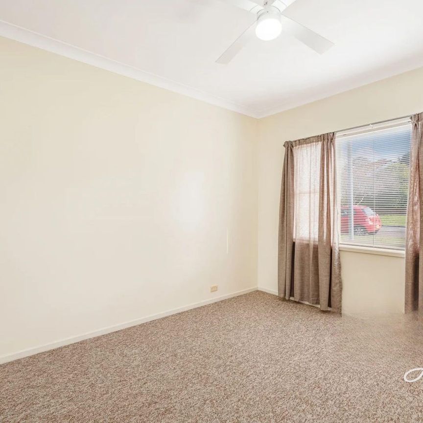 FRESHLY UPDATED HOME IN A CONVENIENT LOCATION - Photo 1