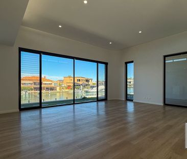 Rental Available - Well appointed 3 by 3 stunner with estuary access - Photo 1
