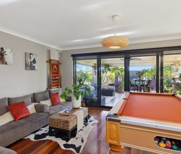 Spacious 4x2 Family Home with Stunning Backyard & Spa - Photo 3