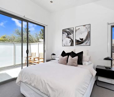 Striking Style, Sophisticated Living - Spacious Three-Level Townhouse! - Photo 1