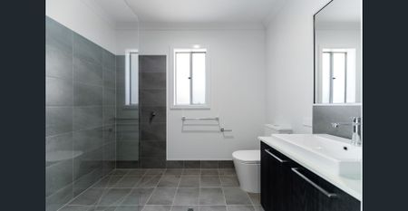 Receive $1,000 FREE rent when you secure this home!!! *Modern 4-Bedroom Home for Lease in Fraser Rise! - Photo 3