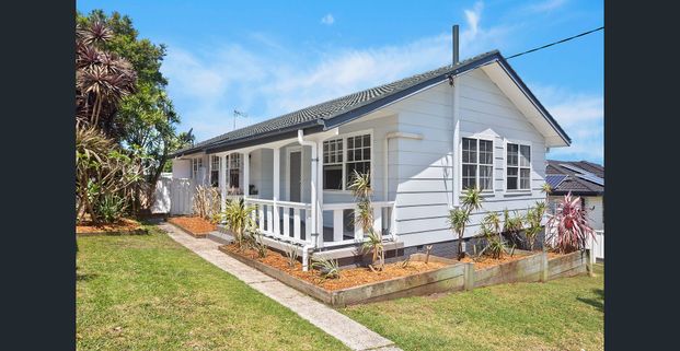 Comfortable Family Home in a Convenient Location - Photo 1