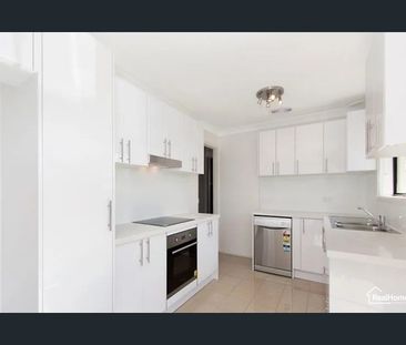 Charming Family Home with Spacious Yard in Prime Quakers Hill Location - Photo 1