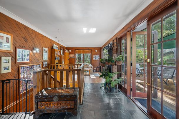 TOP OF THE TREE TOPS HOME WITH LAKE VIEWS - Photo 1