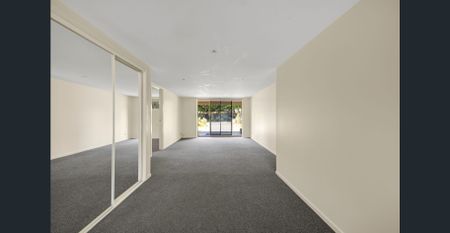 Ground-Level Duplex Living in Florida Gardens - Photo 2