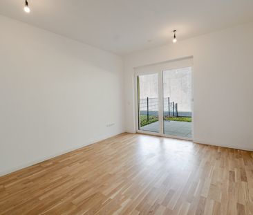Barrierefreie Gartenwohnung mit Terrasse und Tiefgaragenparkplatz - Photo 1