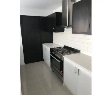 “4 BEDROOM HOME WITH 2 LIVING SPACES!” - Photo 2