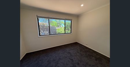 Freshly Renovated Family Home in the Heart of Ambarvale! - Photo 2