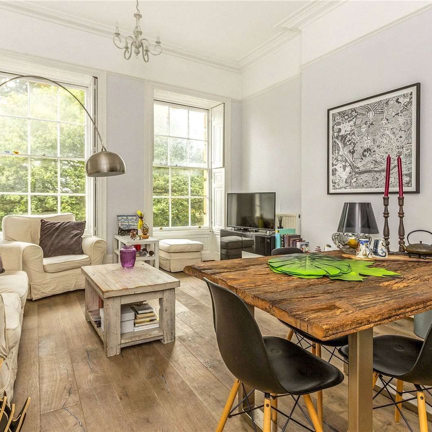 A raised hall floor flat in this Grade II listed Bath stone fronted crescent in the heart of Clifton Village. - Photo 1