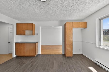 Appartement à louer - Laval (Sainte-Rose) (Val/Jardins Ste-Rose) - Photo 3