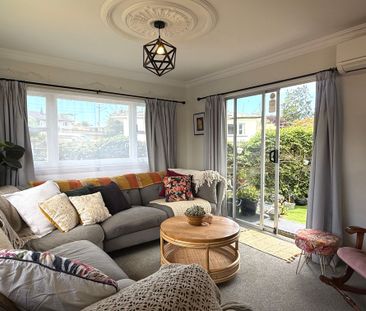 Character 1950s Cottage with Modern Comforts - Photo 1