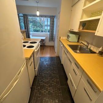 Charming 2-Bedroom Furnished Suite Steps from Kits Beach! - Photo 3