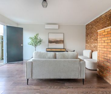 This newly renovated 2-bedroom unit offers modern, low-maintenance ... - Photo 5