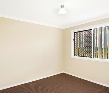 Hamptons-Style Split-Level Unit with Views! - Photo 2