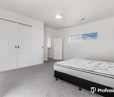 Lifestyle & Convenience in a Spacious Family Home - Photo 6