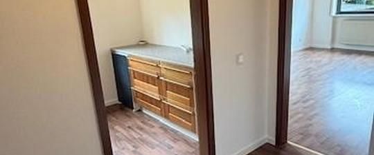 Charmante 1-Zimmer-Erdgeschosswohnung mit eigenem Gartenanteil - Foto 1
