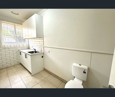 Spacious Family Home with Secure Yard and Ample Parking - Photo 6