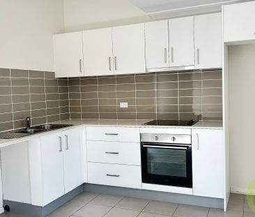 Freshly renovated, Spacious Loft-Style Apartment in the Heart of Gu... - Photo 3